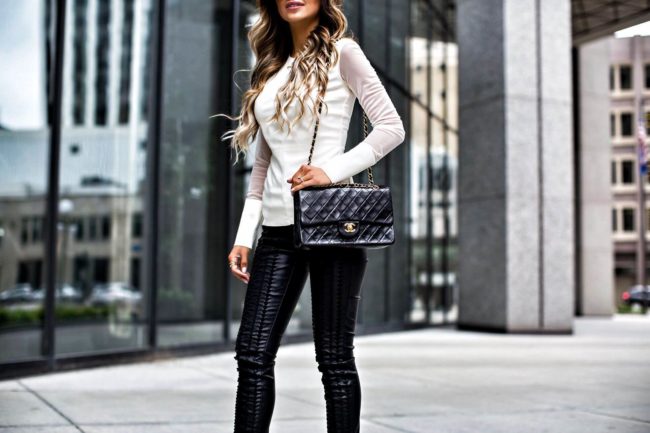 fashion blogger mia mia mine wearing a nordstrom top and blank denim leather pants