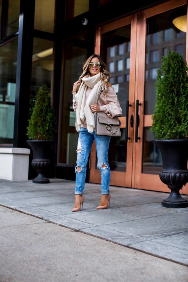 fashion blogger mia mia mine wearing a fall outfit by free people