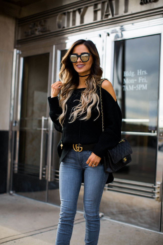 fashion blogger mia mia mine wearing a cold-shoulder sweater by sanctuary from nordstrom