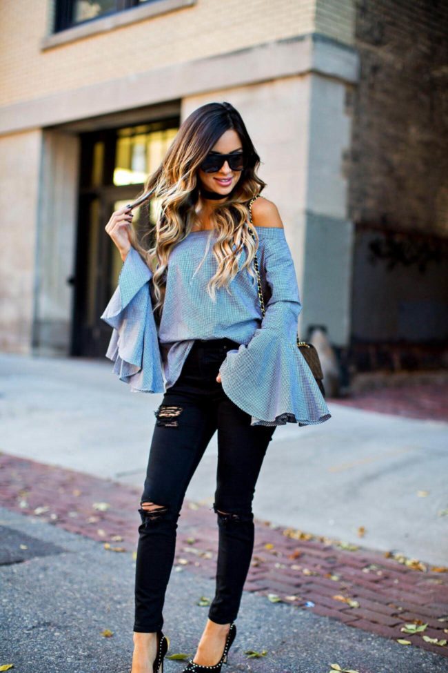 fashion blogger wearing a bell sleeve top from chicwish