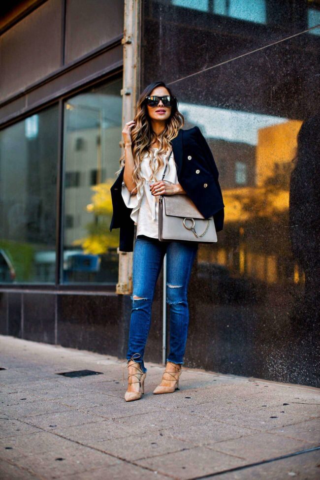 fashion blogger mia mia mine wearing a topshop blazer and ag jeans from nordstrom