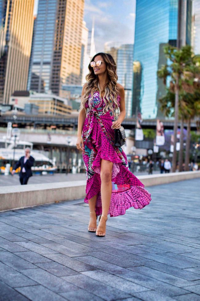 fashion blogger mia mia mine wearing a desert discotheque dress by camilla