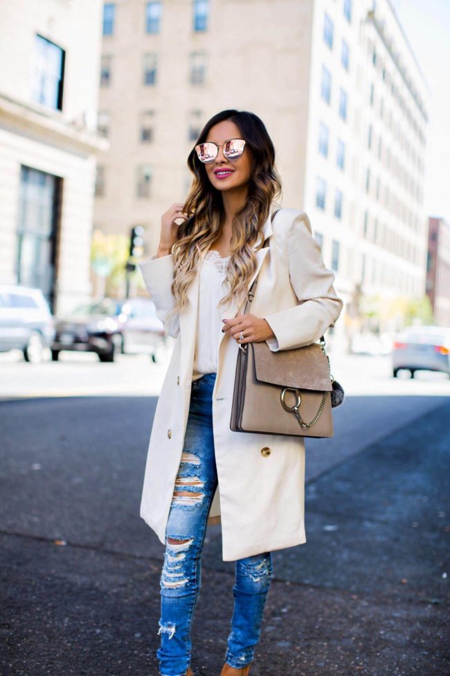 fashion blogger mia mia mine carrying a chloe faye medium bag in motty grey