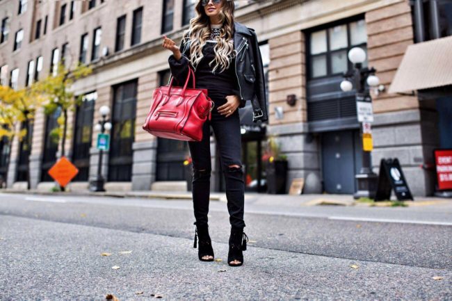 mn fashion blogger mia mia mine wearing black ripped jeans and black booties from nordstrom