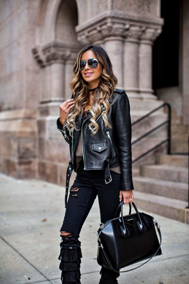 fashion blogger Mia Mia Mine wearing a kate spade leather jacket and quay aviator sunglasses