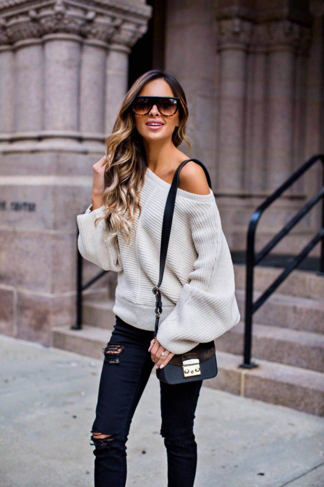 mn fashion blogger mia mia mine wearing a topshop kimono sleeve sweater and black ripped jeans from nordstrom