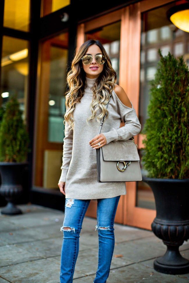 fashion blogger mia mia mine in a cold shoulder sweater and ag jeans from nordstrom