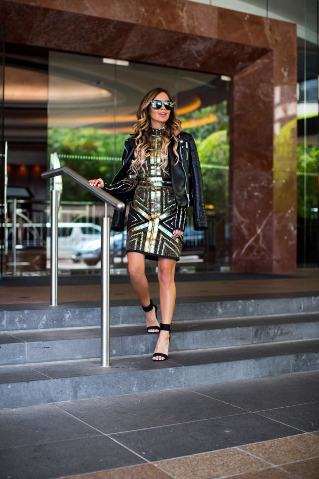 Fashion blogger Mia Mia Mine wearing a gold sequin dress from missguided