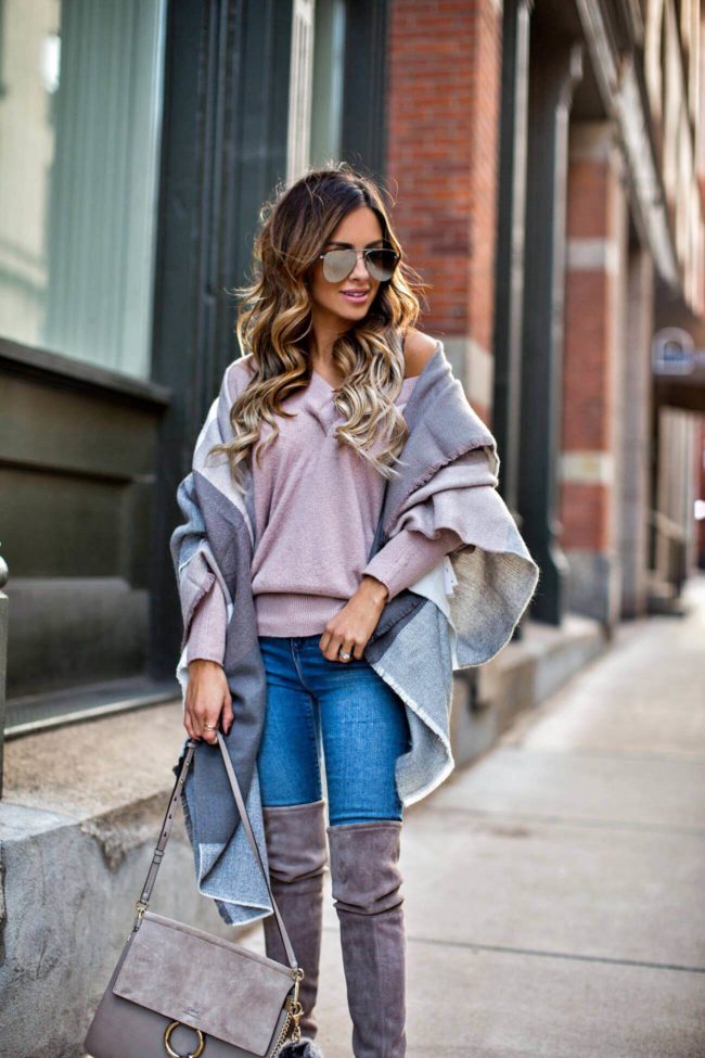 fashion blogger mia mia mine wearing over-the-knee boots and a blanket scarf from asos