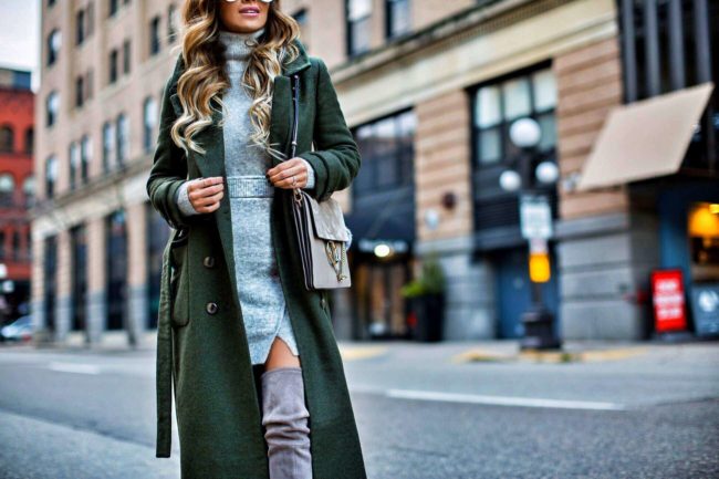 fashion blogger mia mia mine wearing a gray sweater dress from asos and gray over-the-knee boots by stuart weitzman