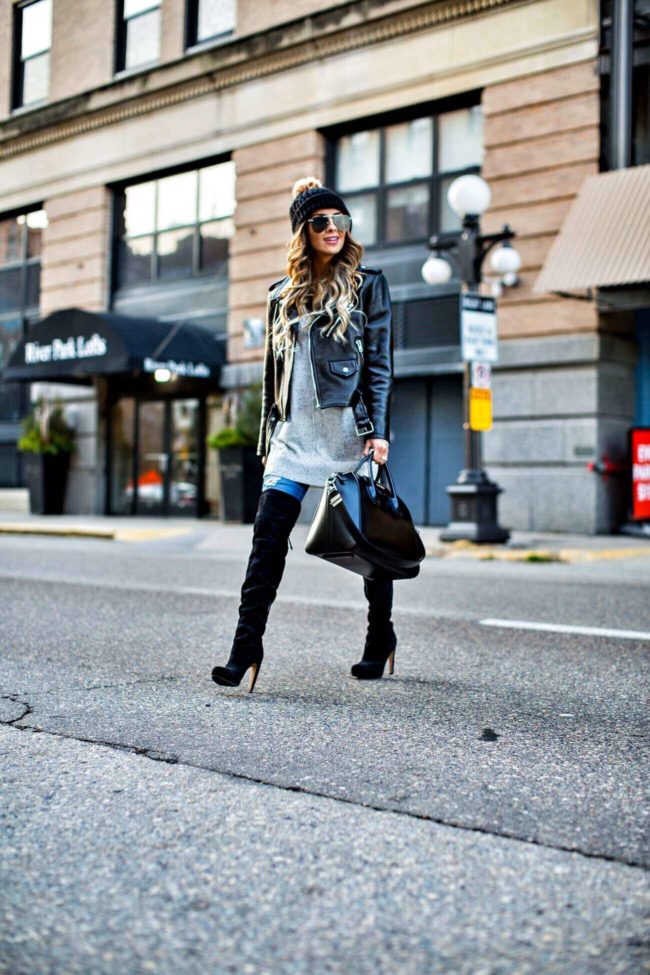 fashion blogger mia mia mine wearing a leather jacket and over-the-knee boots from nordstrom