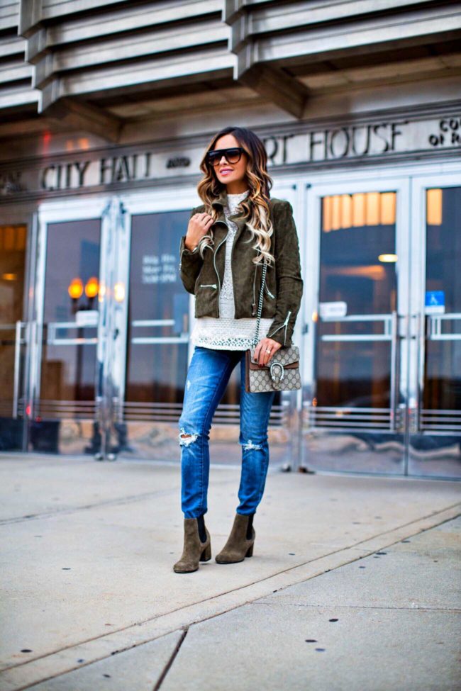 fashion blogger mia mia mine wearing an olive suede moto jacket and blanknyc jeans