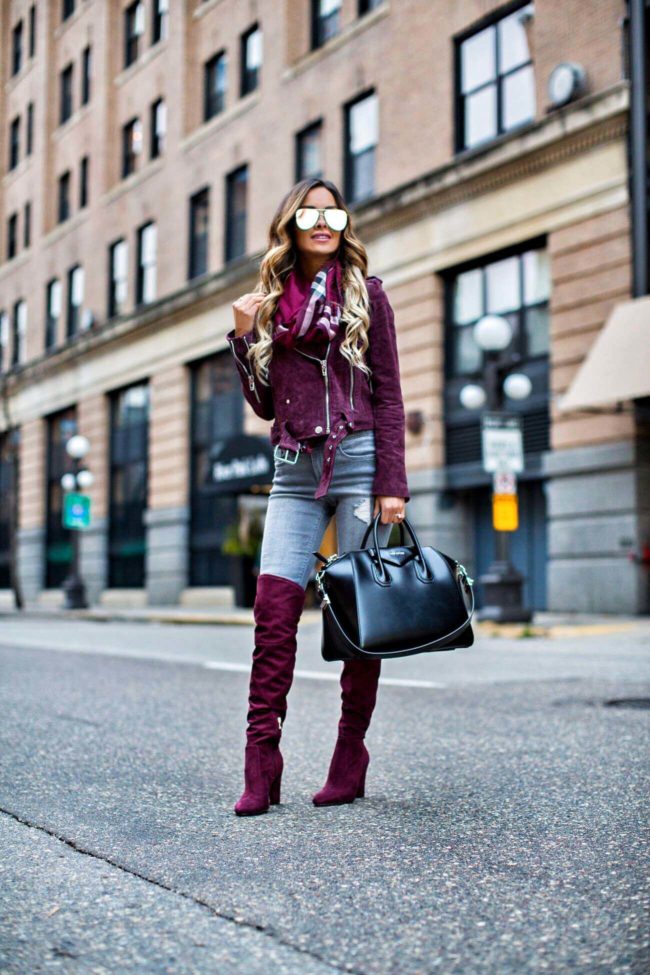 fashion blogger mia mia mine wearing a blanknyc burgundy suede jacket and over-the-knee boots from nordstrom