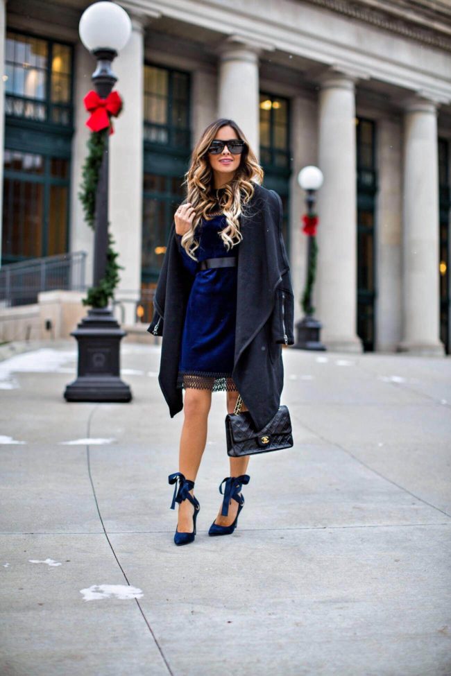 fashion blogger mia mia mine wearing a velvet dress from nordstrom, ribbon heels and a blanknyc black coat