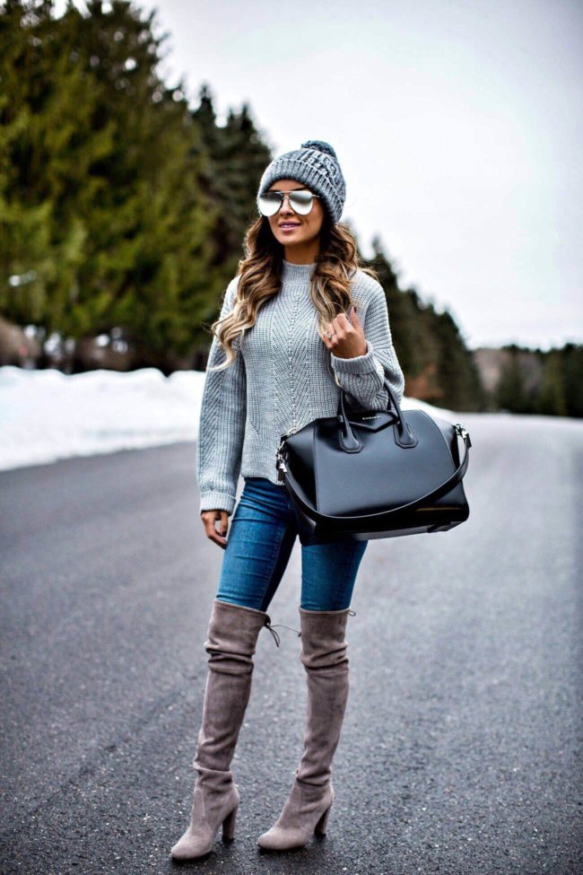 fashion blogger mia mia mine wearing a topshop sweater and stuart weitzman over-the-knee boots from nordstrom