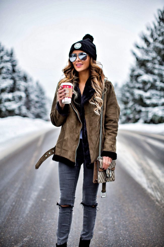 fashion blogger mia mia mine wearing an olive shearling jacket from topshop and a herschel hat from nordstrom