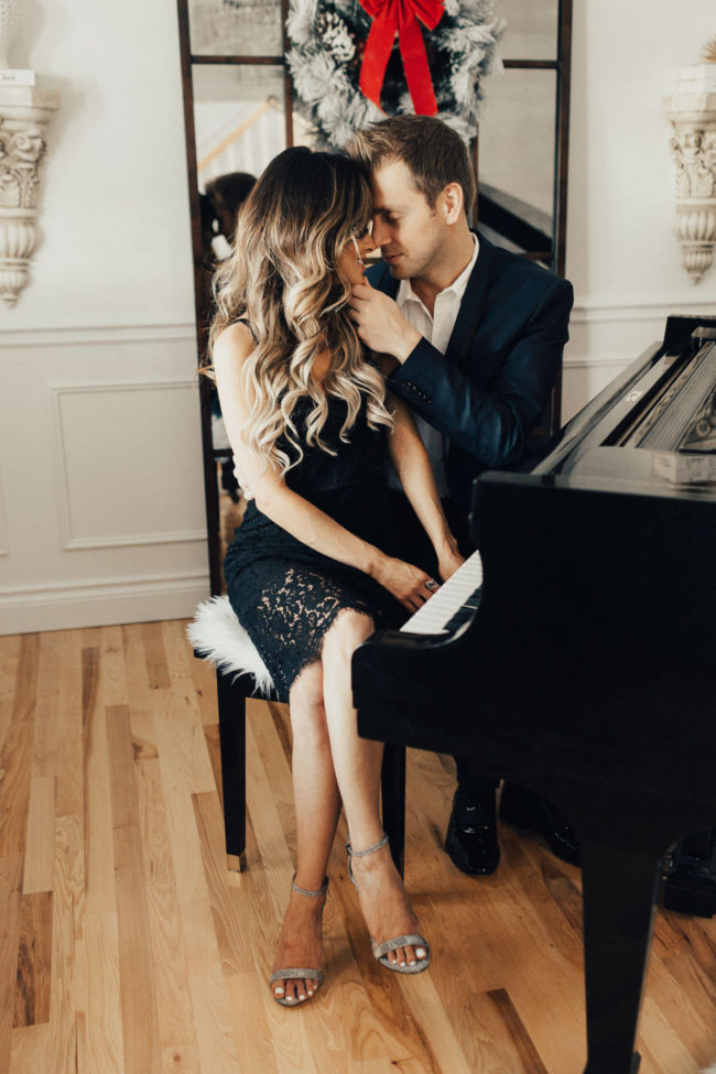 fashion blogger mia mia mine wearing a lace dress at husband phil thompson's grand piano