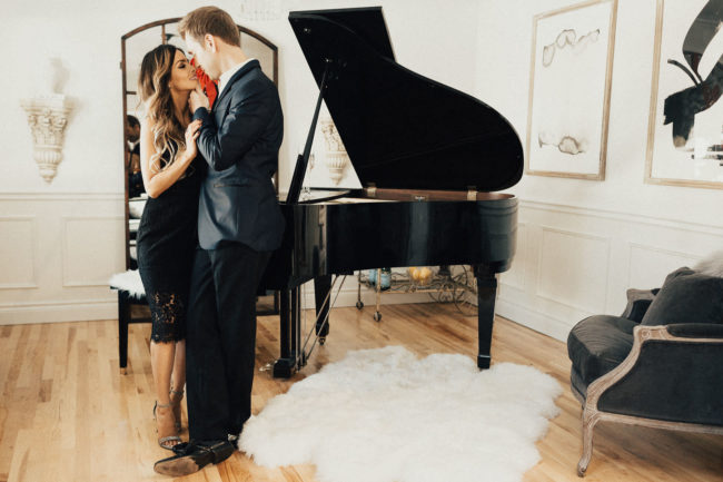 mia mia mine and husband with a grand piano for new year's