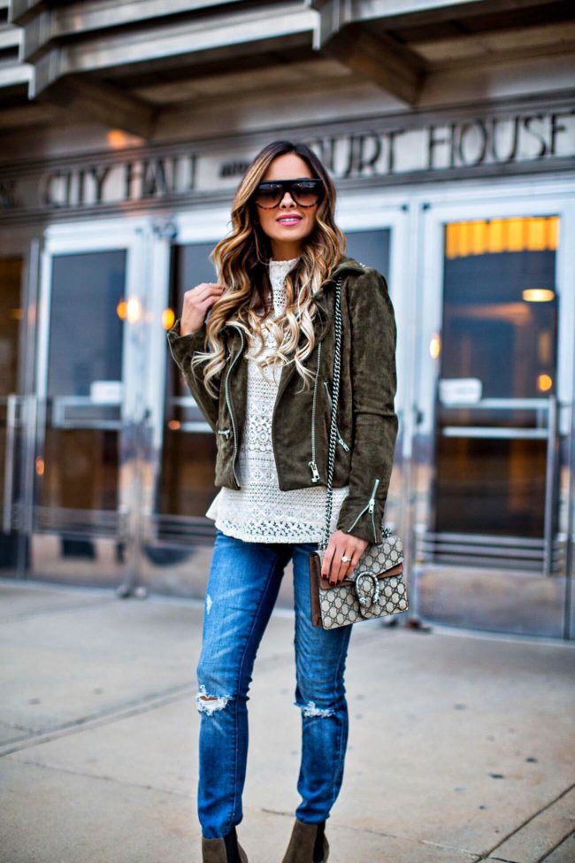 fashion blogger mia mia mine wearing a green suede moto jacket and blanknyc jeans from shopbop
