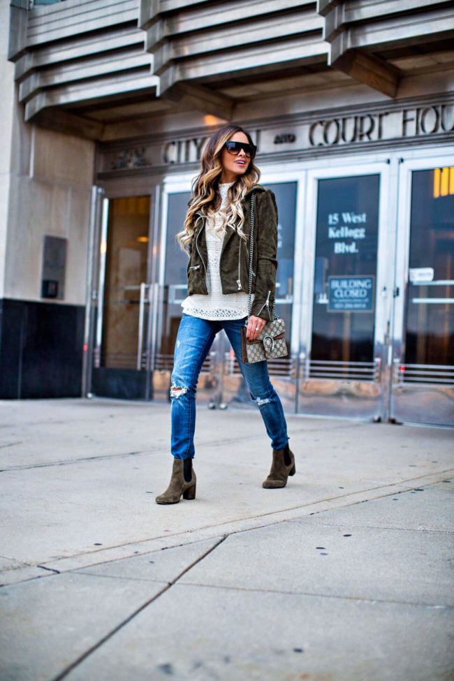 fashion blogger mia mia mine wearing a green moto suede jacket from nordstrom and blanknyc jeans