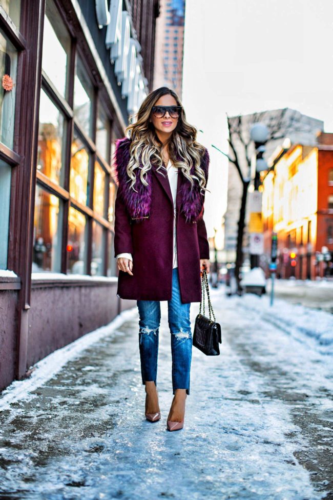 fashion blogger mia mia mine wearing a burgundy coat from nordstrom and celine sunglasses 