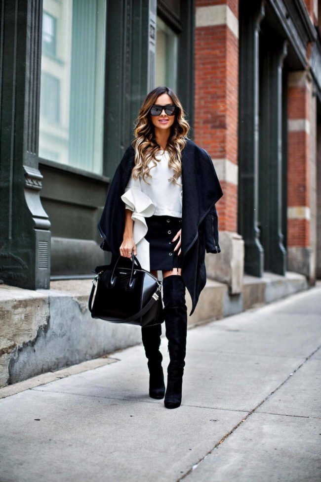 fashion blogger mia mia mine wearing over-the-knee boots and a waterfall jacket from nordstrom
