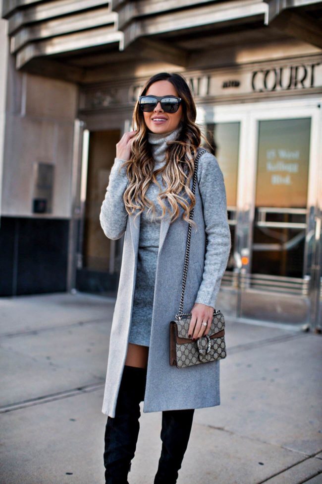 fashion blogger mia mia mine wearing a gray sweater dress from asos and a gucci dionysus bag