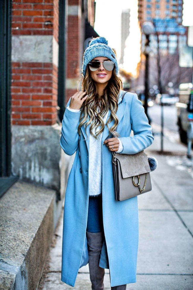 mn fashion blogger mia mia mine wearing a baby blue coat from nordstrom and le specs sunglasses