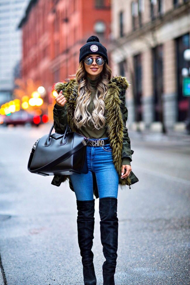 mn fashion blogger mia mia mine wearing a camo coat from nastygal and a moschino belt
