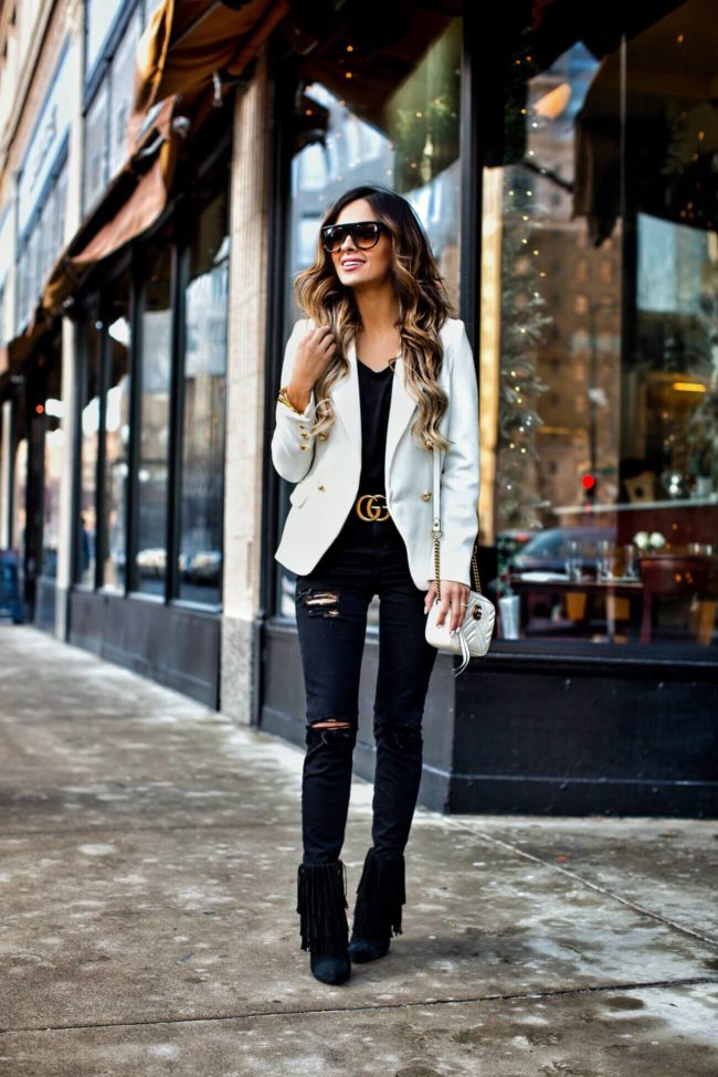 mn fashion blogger mia mia mine wearing a white blazer and a gucci double g buckle belt