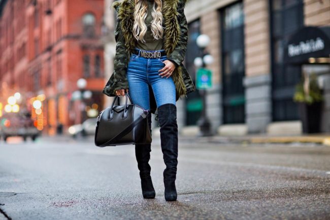 fashion blogger mia mia mine wearing a camo coat from nastygal and black over-the-knee boots from nordstrom