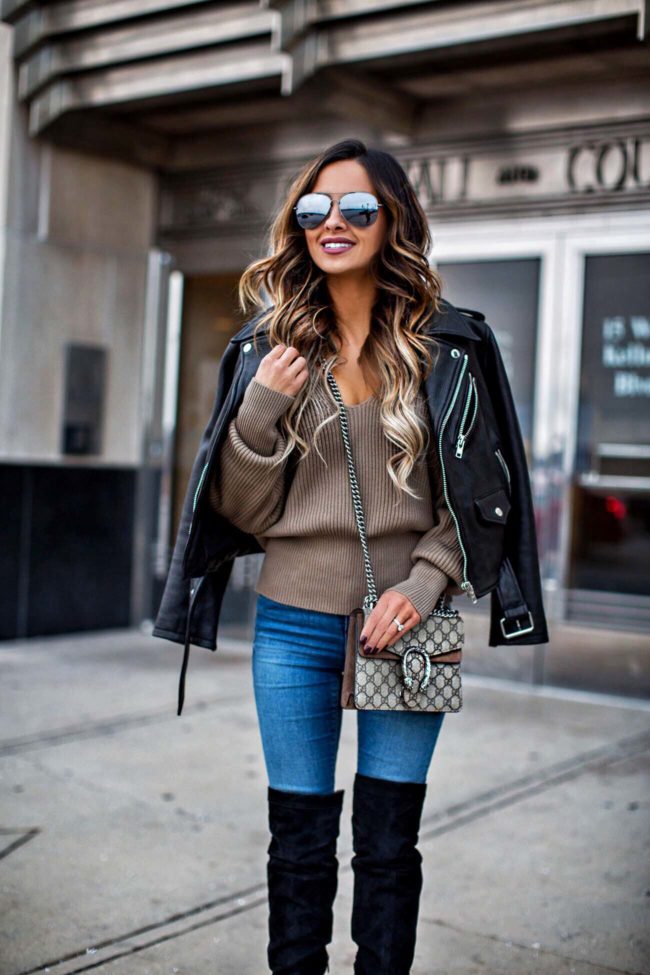mn fashion blogger mia mia mine wearing a leather jacket from nordstrom and a gucci dionysus bag