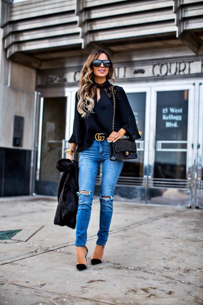 fashion blogger mia mia mine wearing a gucci belt and a chanel bag