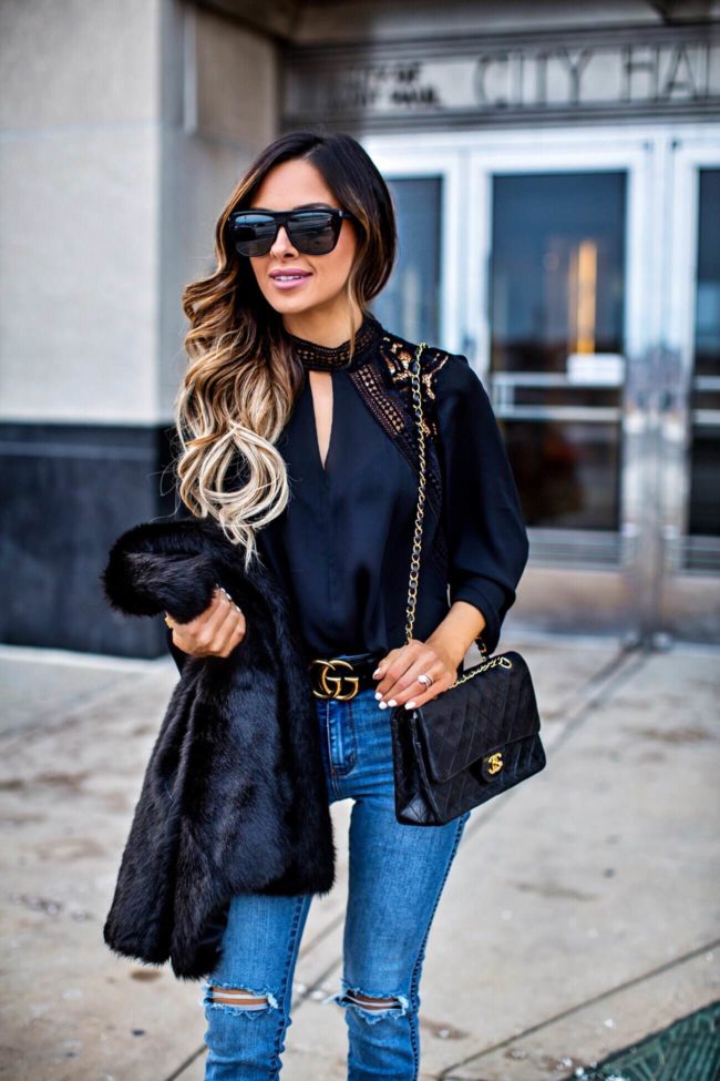Fashion blogger mia mia mine wearing a statement sleeve top from jc penney and a gucci belt