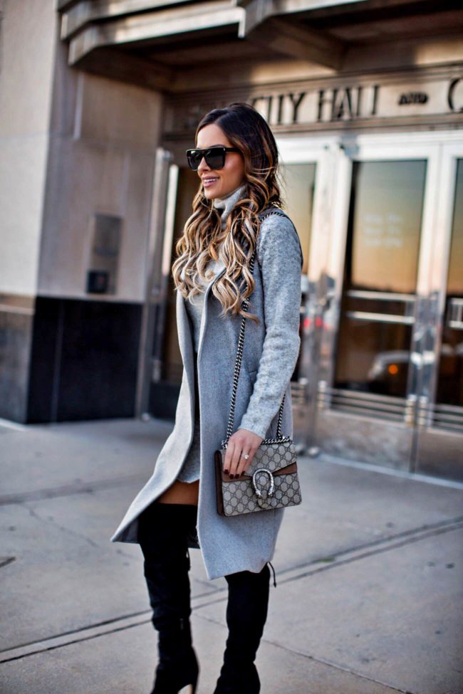 fashion blogger mia mia mine wearing saint laurent sunglasses and a gucci dionysus bag