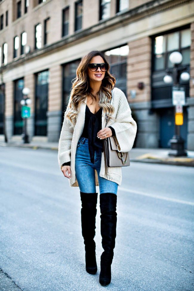 fashion blogger mia mia mine wearing a tie front bodysuit from nordstrom and black over-the-knee boots