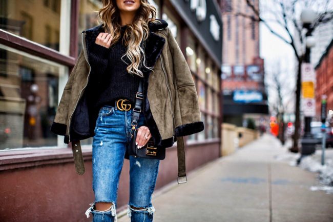 fashion blogger mia mia mine wearing a shearling jacket from topshop and grlfrnd ripped jeans from revolve