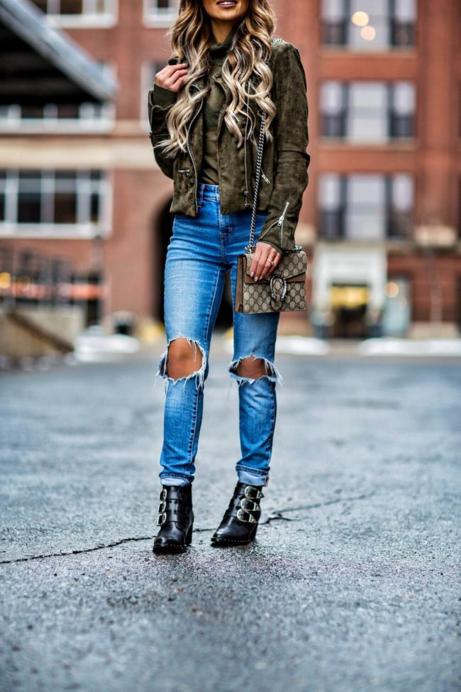 fashion blogger mia mia mine wearing levi's ripped jeans and triple buckle booties from asos