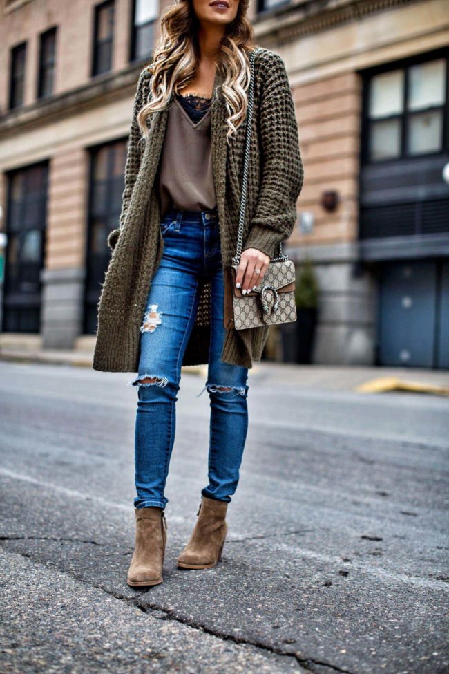 fashion blogger mia mia mine wearing an olive waffle knit cardigan and ag jeans from nordstrom