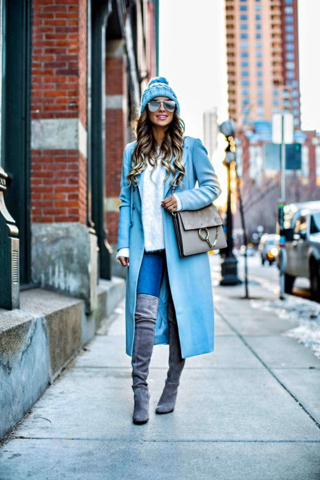 fashion blogger mia mia mine wearing a baby blue coat from nordstrom and a chloe faye medium bag