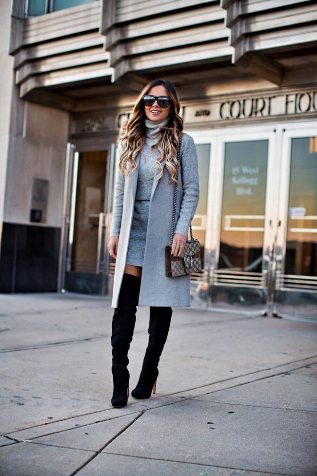 fashion blogger mia mia mine wearing black over-the-knee boots from nordstrom and a gucci dionysus bag