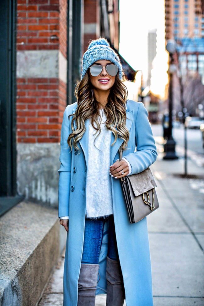 fashion blogger mia mia mine wearing a winter outfit in st paul minnesota