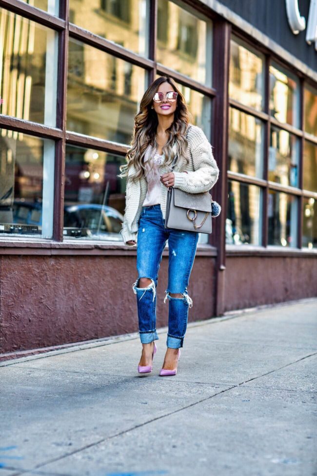 fashion blogger mia mia mine wearing a casual winter outfit from revolve