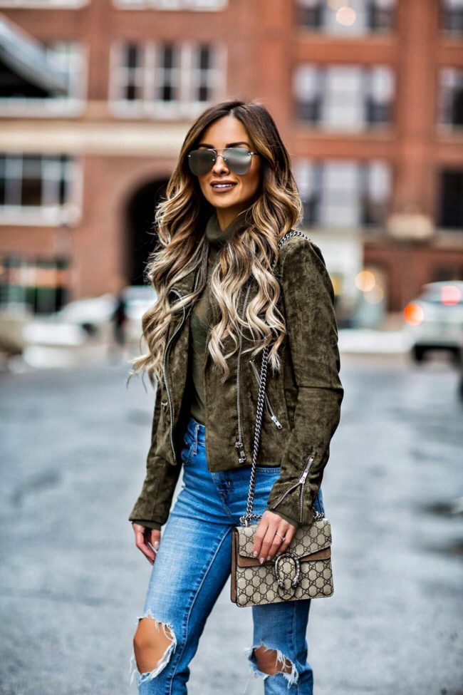 fashion blogger mia mia mine wearing a blanknyc suede jacket and a gucci dionysus bag