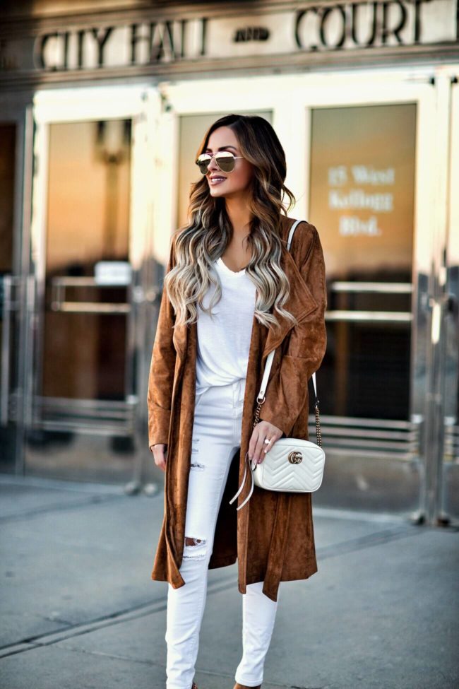 fashion blogger mia mia mine wearing a gucci marmont bag