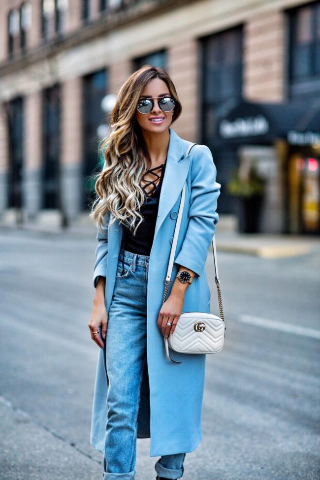 fashion blogger mia mia mine wearing a cluse watch