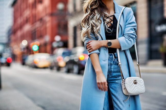 fashion blogger mia mia mine wearing a cluse watch and gucci bag 