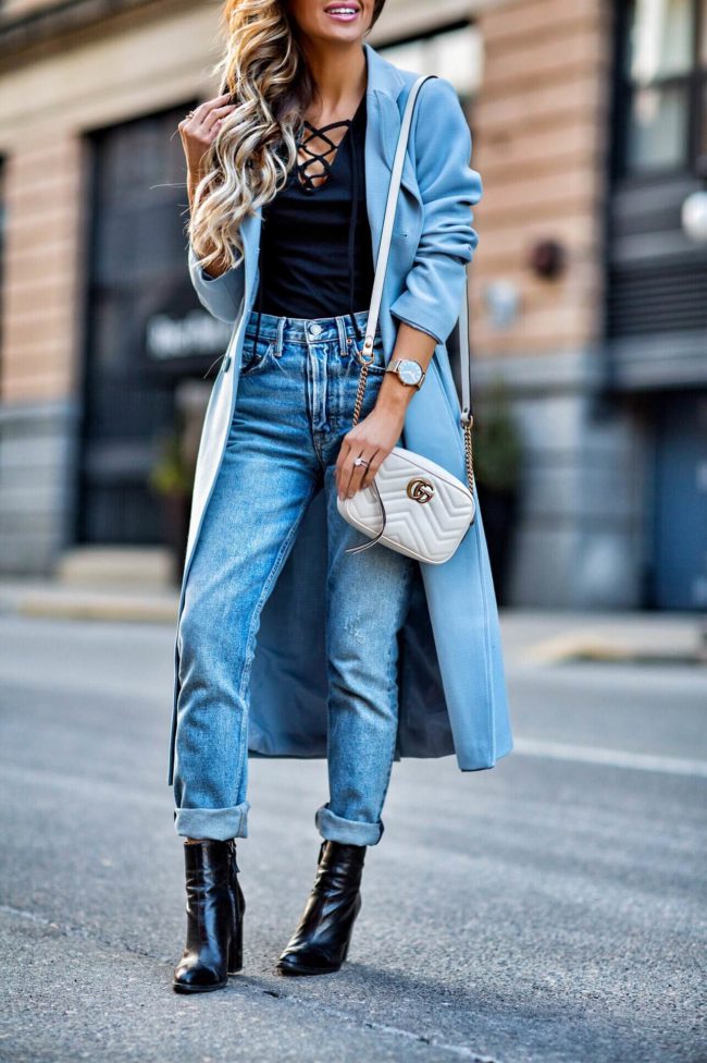 fashion blogger mia mia mine wearing a gucci marmont bag and cluse la boheme watch
