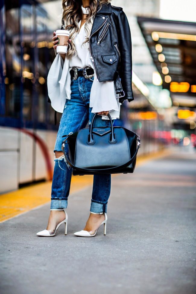 fashion blogger mia mia mine wearing grlfrnd jeans from revolve and a givenchy bag