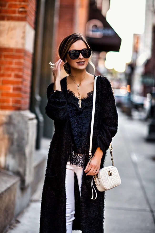 fashion blogger mia mia mine wearing a vanessa mooney gold dixie choker and a gucci marmont bag